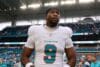 Miami Dolphins tight end Jonnu Smith stands on the sidelines.