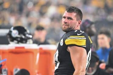 TJ Watt stands on the sidelines.