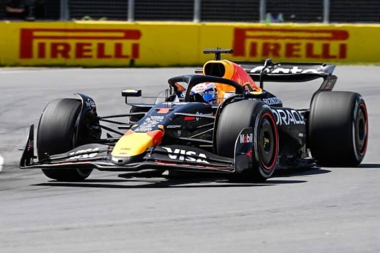 Red Bull Racing driver Max Verstappen driving a car.