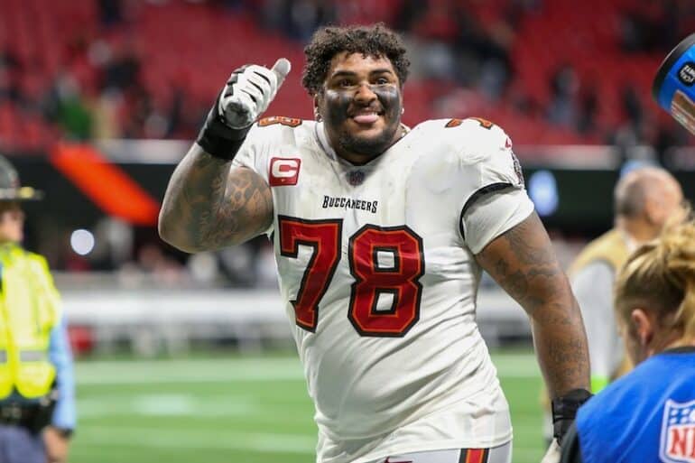 Tampa Bay Buccaneers offensive tackle Tristan Wirfs puts his thumb up.
