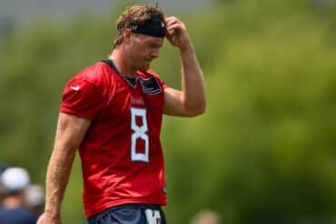 Tennessee Titans quarterback Will Levis puts his hand on his head.