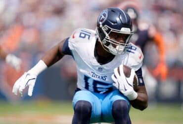 Tennessee Titans wide receiver Treylon Burks running with the ball.