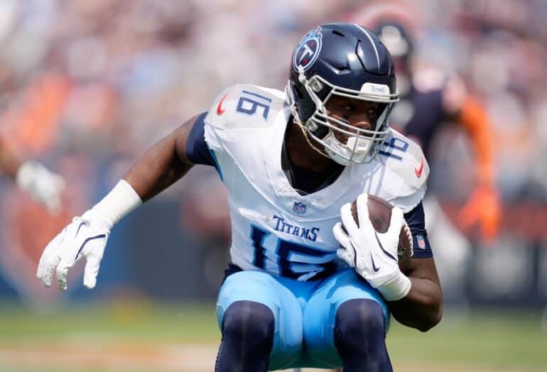 Tennessee Titans wide receiver Treylon Burks running with the ball.