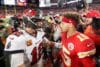 Tom Brady and Patrick Mahomes greet.