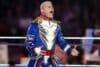 Cody Rhodes celebrates in the ring.