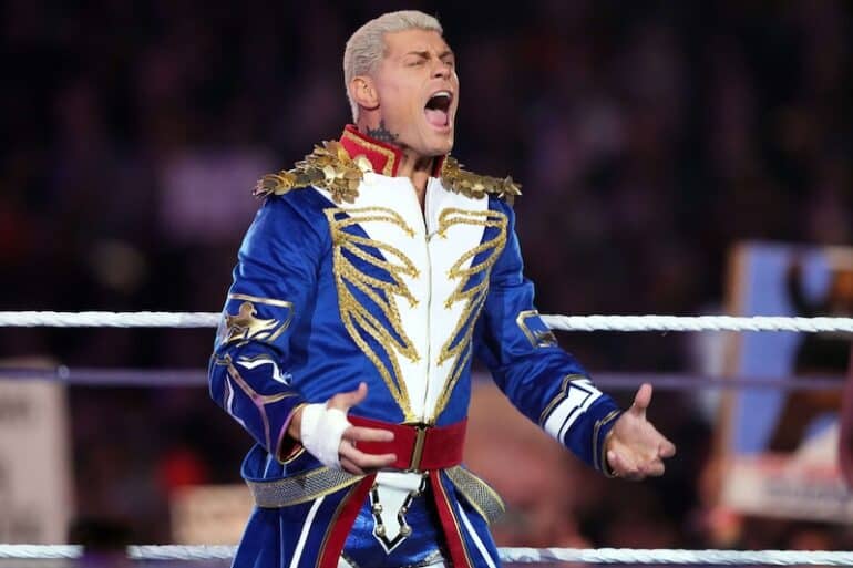 Cody Rhodes celebrates in the ring.