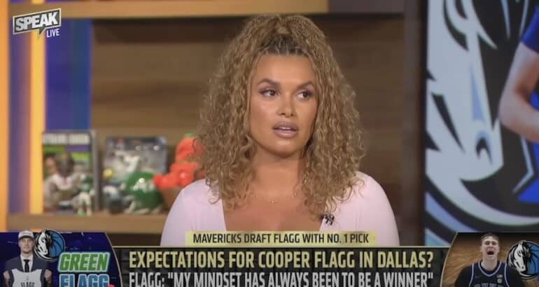 Joy Taylor sits at the FS1 desk.