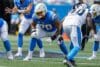 Rashawn Slater lines up to block.