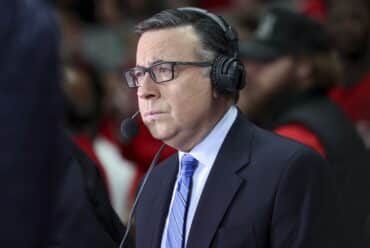 Ian Eagle with a microphone.