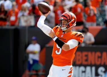 Joe Burrow keeps the ball over his head.