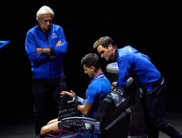 Federer chats with Djokovic as Borg looks on