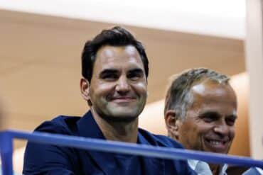 Roger Federer watching a match