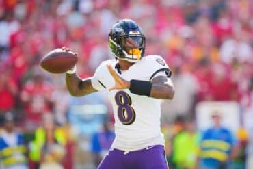 Lamar Jackson throws the ball.
