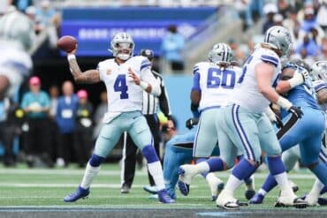 Dak Prescott readies to throw the ball.