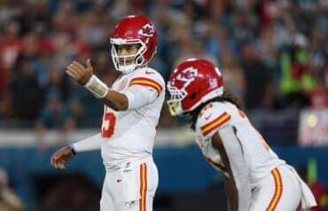 Patrick Mahomes stands up.