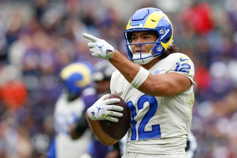 Puka Nacua points with the ball.