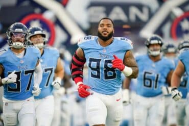 Tennessee Titans defensive tackle Jeffery Simmons runs out the tunnel.
