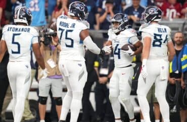 The Tennessee Titans celebrate in the end zone.
