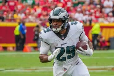 Philadelphia Eagles running back AJ Dillon holds the ball.