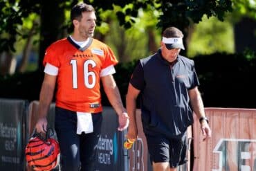 Joe Flacco walks off the field.