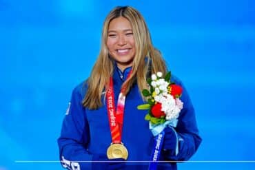 Chloe Kim poses with her medal.