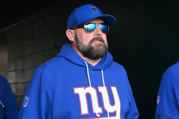 Giants head coach Brian Daboll stares.