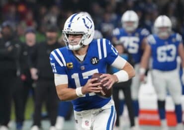 Indianapolis Colts quarterback Daniel Jones holds the ball.
