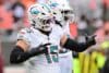 Miami Dolphins linebacker Jaelan Phillips points.