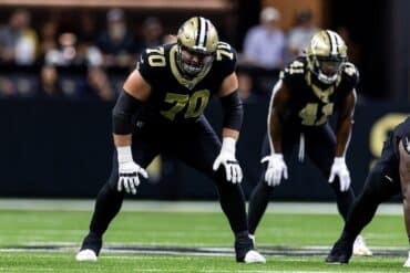 New Orleans Saints offensive tackle Trevor Penning sets up.