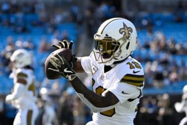 Brandin Cooks goes to catch a football.