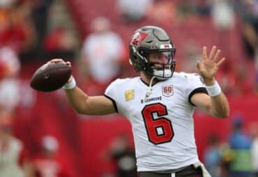 Baker Mayfield goes back to pass.