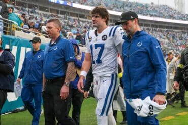 Colts QB Daniel Jones walks off the field.