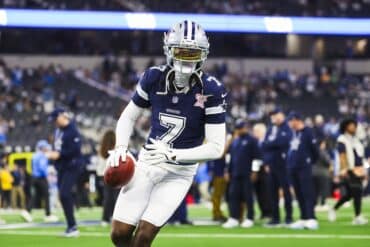 Cowboys cornerback Trevon Diggs holds the ball.