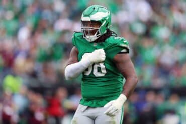 Jalen Carter puts hands on chest.