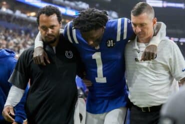 Sauce Gardner walks off the field.
