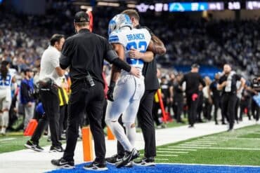 Lions safety Brian Branch walks off field.