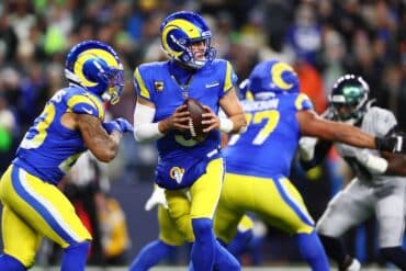 Rams quarterback Matthew Stafford holds the ball.
