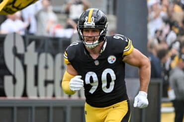 T.J. Watt runs on the field.