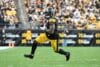 DK Metcalf runs with the ball.