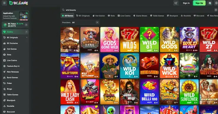A screenshot of the casino game lobby at BC.Game showing Wild Bounty Showdown slot and other casino games