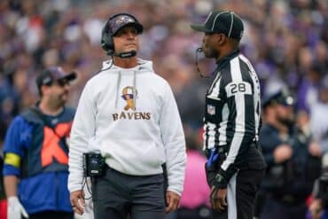 John Harbaugh patrols the sidelines.