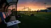 USMNT training facility at sunset with tactical clipboard representing World Cup squad selection