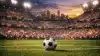 Packed international football stadium at twilight with ball on pitch and crowd-filled stands