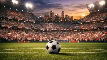 Packed international football stadium at twilight with ball on pitch and crowd-filled stands