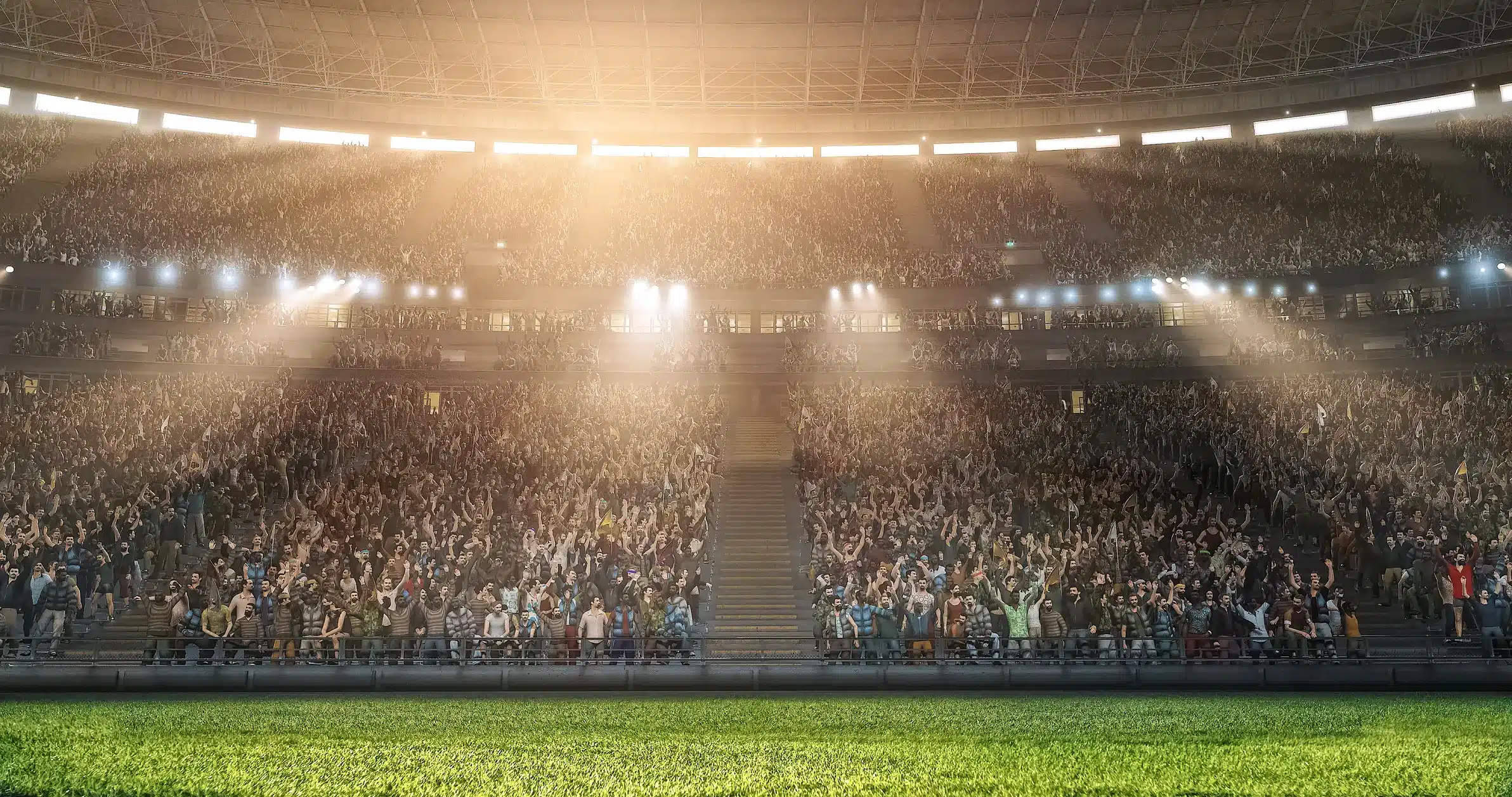 Crowd cheering in a stadium during a soccer match with bright lights.