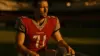 Tampa Bay Buccaneers quarterback on sideline contemplating contract negotiations and future