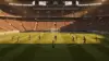 World Cup soccer stadium with players in action during tournament match