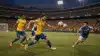 Brazil and Japan players competing in intense World Cup knockout match under stadium lights