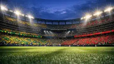 MetLife Stadium illuminated at twilight with fans in Brazilian and Moroccan colors for World Cup match