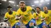 Brazilian national soccer team players in yellow jerseys during intense World Cup match action